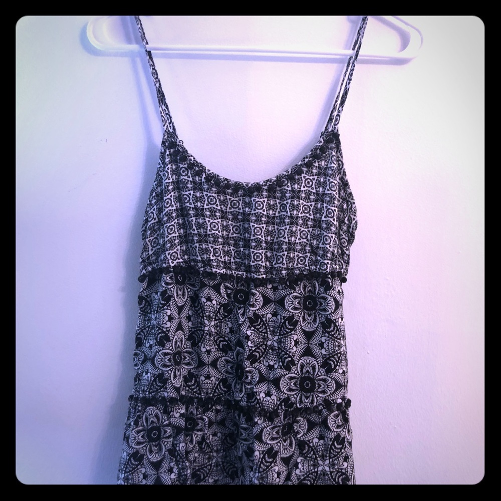 Size medium. Super cute, gently worn black top